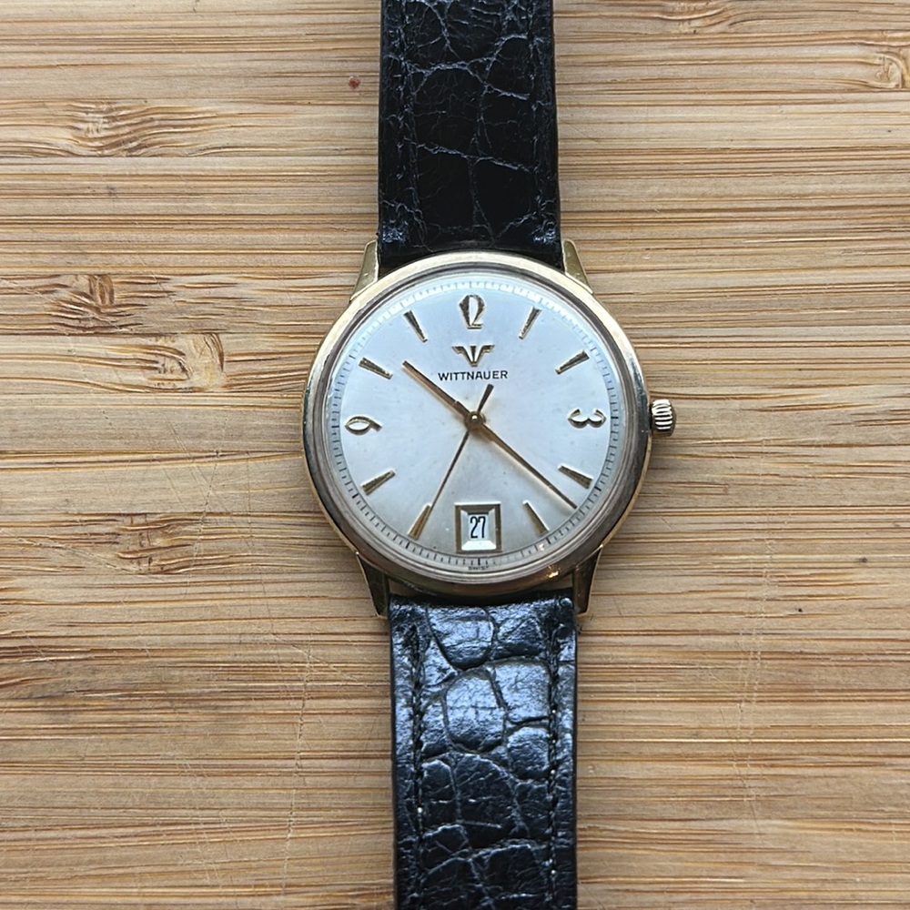 Men’s vintage WITTNAUER 1972 10k gold rgp case with leather band .